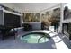 Relaxing hot tub with a modern design, covered area, and views of the property at 45 Sycamore Ave # 634, Charleston, SC 29407