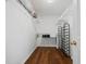 Walk-in closet with hardwood floors and shelving for optimal storage at 521 Holiday Dr, Summerville, SC 29483