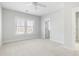 Bright bedroom with large windows, neutral walls, and a ceiling fan provides a relaxing atmosphere at 5680 Barbary Coast Rd, Hollywood, SC 29449