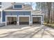 Spacious three-car garage with ample parking and storage space, perfect for car enthusiasts at 5680 Barbary Coast Rd, Hollywood, SC 29449