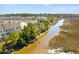 Beautiful aerial view of the neighborhood community along the marsh at 591 Mclernon Trace, Johns Island, SC 29455