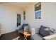 Cozy back porch with comfortable seating, perfect for enjoying the outdoors at 591 Mclernon Trace, Johns Island, SC 29455