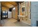 Unfinished basement with sink, refrigerator, and plumbing, perfect for storage at 591 Mclernon Trace, Johns Island, SC 29455