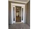 Inviting entryway with a wood-look floor, framed by white trim, leading into the bright home at 631 Marsh Cove Cir, Summerville, SC 29486