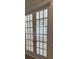 Elegant French doors with glass panes, providing natural light and a seamless transition between spaces at 631 Marsh Cove Cir, Summerville, SC 29486