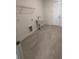 Laundry room with drop-in sink and tiled floor at 631 Marsh Cove Cir, Summerville, SC 29486