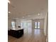 Open-concept living room featuring recessed lighting, and wood-look floors, offering ample space and natural light at 631 Marsh Cove Cir, Summerville, SC 29486