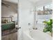 Serene bathroom featuring a soaking tub, frosted window, and a view into the main bedroom at 642 Bridlewood Ln, Mount Pleasant, SC 29466