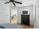 Comfortable bedroom includes a dark wood dresser and doorway leading to another room at 642 Bridlewood Ln, Mount Pleasant, SC 29466