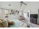 Bright bedroom features vaulted ceilings, a ceiling fan, and ample natural light from large windows at 642 Bridlewood Ln, Mount Pleasant, SC 29466