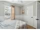 Bedroom featuring a ceiling fan, hardwood flooring, light walls, and neutral colored curtains at 642 Bridlewood Ln, Mount Pleasant, SC 29466