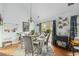 Bright dining room with stylish decor, chandelier, and lots of natural light and hardwood flooring at 642 Bridlewood Ln, Mount Pleasant, SC 29466