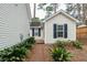 Charming home featuring classic architecture, complemented by a green landscaped walkway at 642 Bridlewood Ln, Mount Pleasant, SC 29466