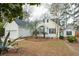 Beautiful single-Gathering home with palm trees, tidy landscaping, and white siding at 642 Bridlewood Ln, Mount Pleasant, SC 29466