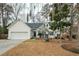 Charming one-story home featuring a manicured lawn and attached two-car garage at 642 Bridlewood Ln, Mount Pleasant, SC 29466