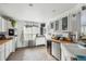 Bright kitchen featuring butcher block countertops, white cabinets, subway tile backsplash, and stainless steel appliances at 642 Bridlewood Ln, Mount Pleasant, SC 29466