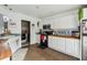Bright kitchen with butcher block counters, white cabinets, subway tile backsplash, and stainless steel appliances at 642 Bridlewood Ln, Mount Pleasant, SC 29466