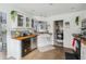 Kitchen featuring white cabinets, butcher block countertops, subway tile backsplash, and stainless steel appliances at 642 Bridlewood Ln, Mount Pleasant, SC 29466