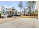 Spacious backyard with a covered patio, fire pit, and a soccer goal at 668 Ferry St, Mount Pleasant, SC 29464