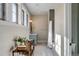 Stylish bathroom featuring three windows, a vanity with blue cabinets, and a shower at 668 Ferry St, Mount Pleasant, SC 29464