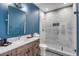 Modern bathroom with marble countertop, stylish fixtures, and glass shower at 668 Ferry St, Mount Pleasant, SC 29464