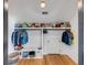 Well-organized closet with hanging rods, shelving, and ample storage space at 668 Ferry St, Mount Pleasant, SC 29464