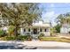 Charming two-story home with lush landscaping, a welcoming front porch and beautiful curb appeal at 668 Ferry St, Mount Pleasant, SC 29464