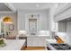 Modern kitchen with marble countertops, stainless steel appliances, and pendant lighting at 668 Ferry St, Mount Pleasant, SC 29464