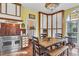 Bright kitchen with stainless steel oven, dining table, and stained glass lighting at 710 S Main St, Summerville, SC 29483