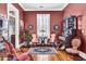 Cozy living room featuring classic furniture, a patterned rug, and plenty of natural light at 710 S Main St, Summerville, SC 29483