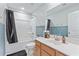 Bright bathroom with wood vanity, shower/tub combination, and modern fixtures at 743 Redbud Ln, Summerville, SC 29486