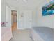 Comfortable bedroom featuring neutral walls, plush carpeting, and an HD television for modern convenience at 743 Redbud Ln, Summerville, SC 29486