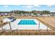 Aerial view showcases community pool, enhancing the appeal of the neighborhood at 743 Redbud Ln, Summerville, SC 29486