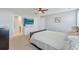Spacious main bedroom with a ceiling fan, TV, ensuite bathroom, and a bed at 743 Redbud Ln, Summerville, SC 29486