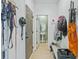 Mud room with a view into a half-bathroom and dark door at 743 Redbud Ln, Summerville, SC 29486