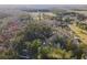 An aerial showing residences nestled within a wooded landscape at 754 Miriam Ln, Ridgeville, SC 29472