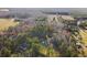 Aerial view of property surrounded by lush green trees and colorful autumn foliage, highlighting the landscape at 754 Miriam Ln, Ridgeville, SC 29472