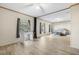Large bedroom with wood flooring, ceiling fan, and windows providing plenty of light at 754 Miriam Ln, Ridgeville, SC 29472