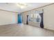 Bright and spacious living room with neutral walls, wood-look floors, and natural light at 754 Miriam Ln, Ridgeville, SC 29472