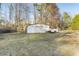 Outbuilding with two garage doors in grassy yard at 754 Miriam Ln, Ridgeville, SC 29472