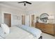 Bedroom featuring an en-suite bathroom, walk-in closet, and large windows at 758 Blueway Ave, Summerville, SC 29486