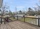 Relax on the spacious wooden deck overlooking the backyard and enjoy the natural surroundings and peaceful setting at 760 Royle Rd, Ladson, SC 29456