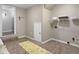 Basement space with tile floors, white door, and carpet at 760 Royle Rd, Ladson, SC 29456