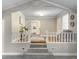 Open-concept living room with vaulted ceilings, and a clear view to the kitchen, and front entrance at 760 Royle Rd, Ladson, SC 29456