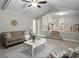 Spacious living room boasts vaulted ceilings, a cozy seating area, and seamless flow to other living spaces at 760 Royle Rd, Ladson, SC 29456