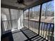 Cozy screened porch with a peaceful view of the surrounding water at 7955 Timbercreek Ln # 1807, North Charleston, SC 29418