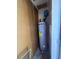 Water heater unit inside storage closet, providing efficient water heating at 7955 Timbercreek Ln # 1807, North Charleston, SC 29418