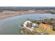 Aerial view featuring a waterfront recreational area with boat ramp, baseball field and open space at 95 Plymouth Ave, Charleston, SC 29412