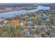 Lovely aerial shot showcasing a beautiful waterfront and surrounding neighborhood at 95 Plymouth Ave, Charleston, SC 29412