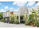 Front exterior of Bar George with plants and light colored sky at 95 Plymouth Ave, Charleston, SC 29412